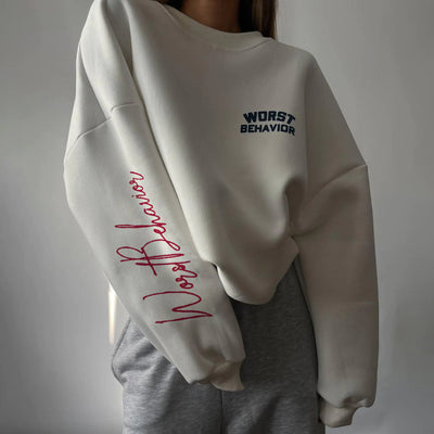 White sweatshirt with blue text on a plain background
