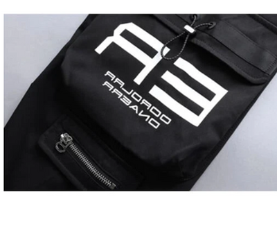 Black jacket with a logo and text on a light gray background