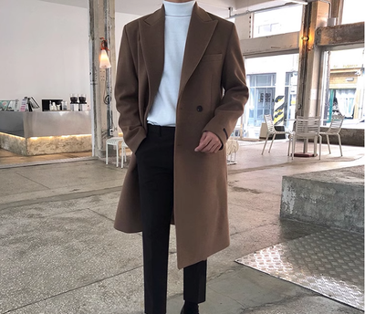 Person wearing a brown coat 