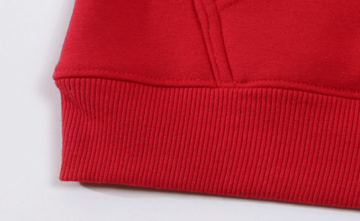 Close-up of a red fabric texture on a white background