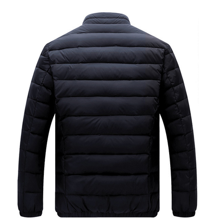 Black puffer jacket on a white background