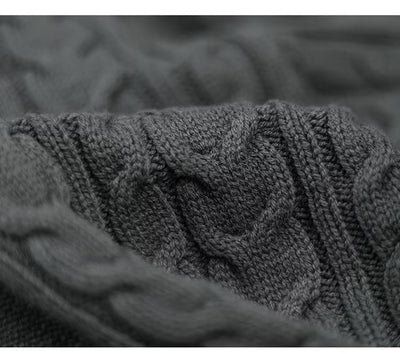 Close-up of a textured gray fabric with intricate patterns