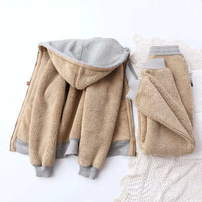 Beige fleece jacket with gray trim on a white background