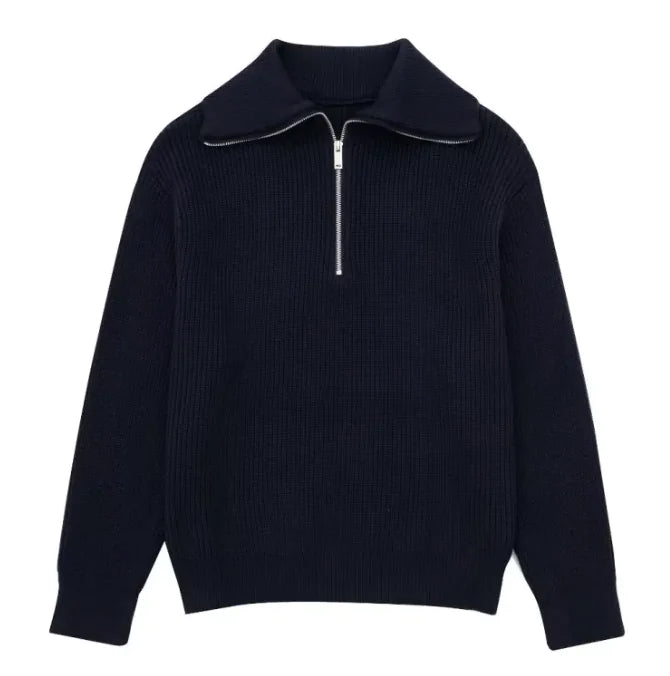 Black ribbed sweater with a zipper on a white background