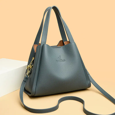 blue handbag with a strap