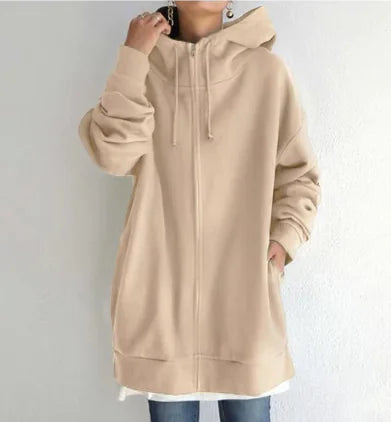 long Beige hoodie worn by a person on a plain background