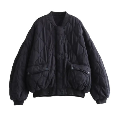Black quilted jacket on a white background