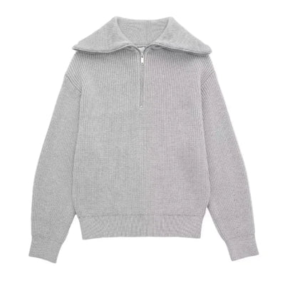 Gray ribbed sweater with a collar on a white background