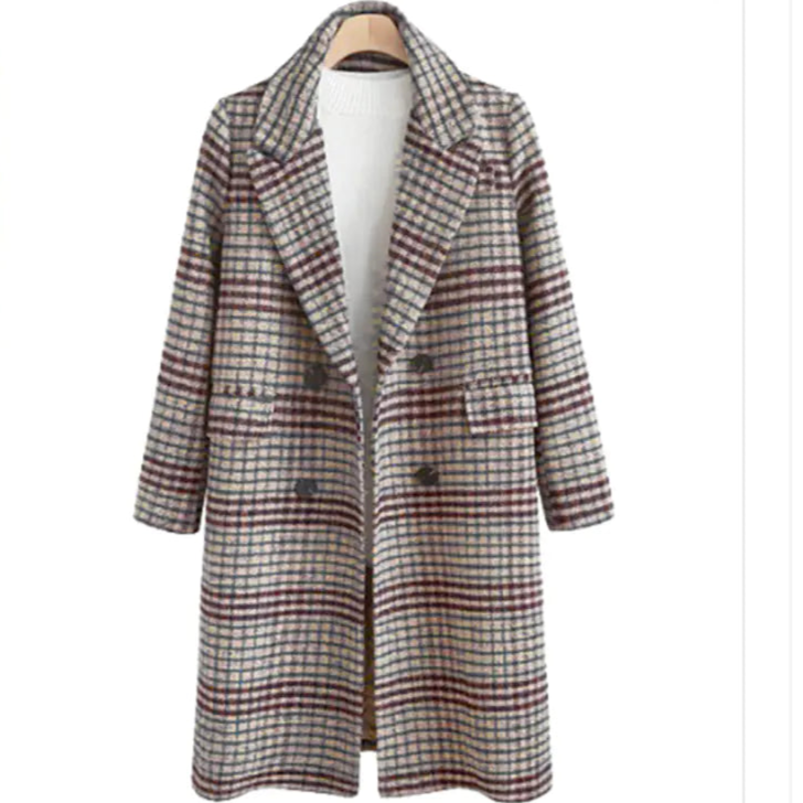 Plaid coat on a mannequin against a white background
