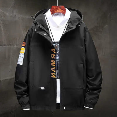 Black jacket with brand logos on a dark background