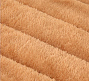 Close-up of beige textured fabric
