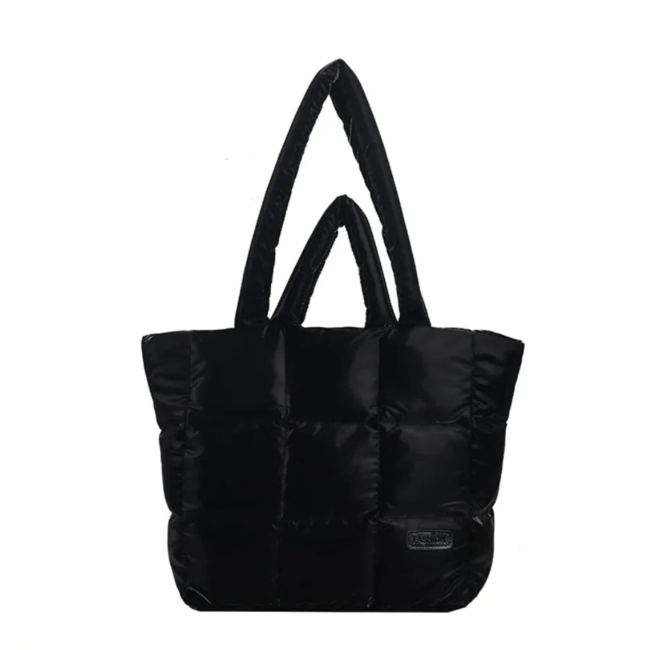 Black puffer tote bag on a white background
