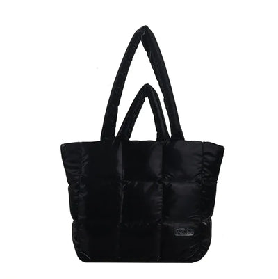 Black puffer tote bag on a white background