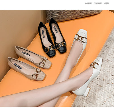 Three pairs of women's shoes on an orange surface with a neutral background
