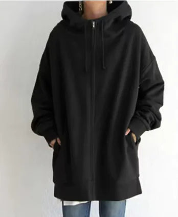 long Black hoodie worn by a person on a white background