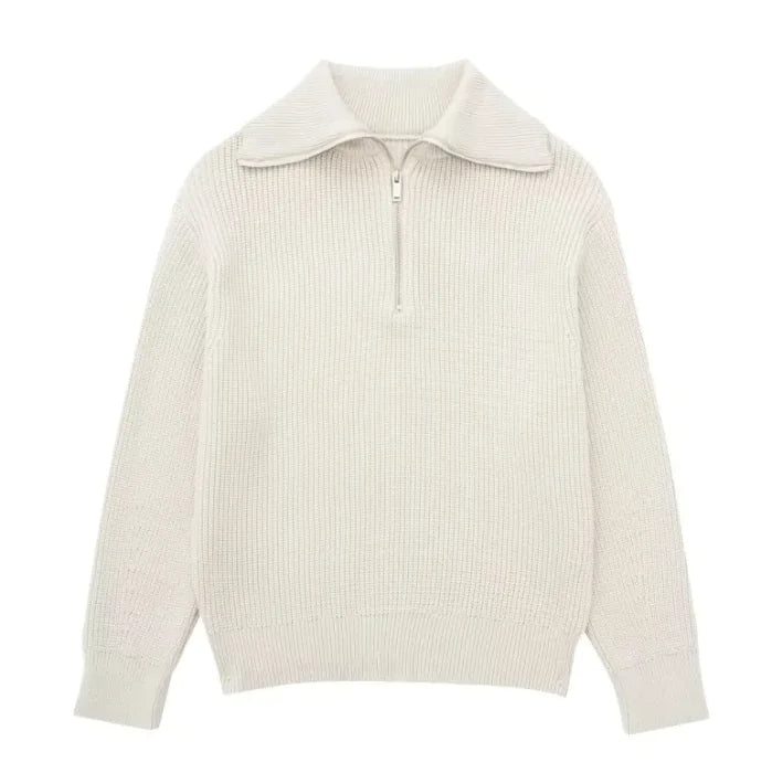 Beige ribbed sweater with a collar on a white background