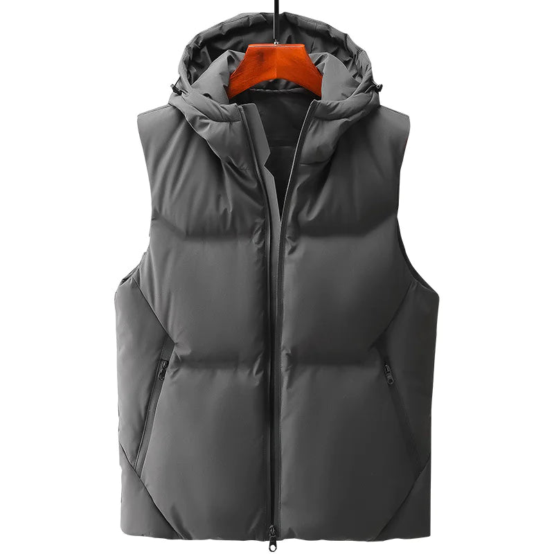 Gray puffer vest on an orange hanger against a white background