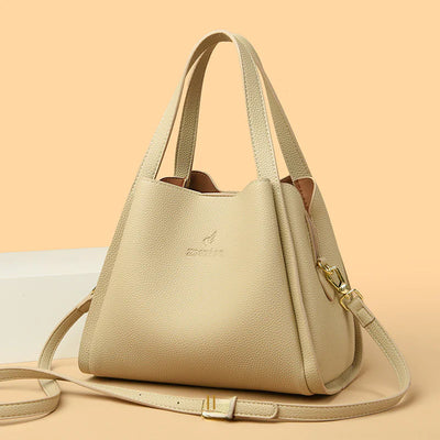 beige handbag with a strap