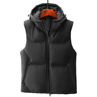 Black puffer vest on a white background