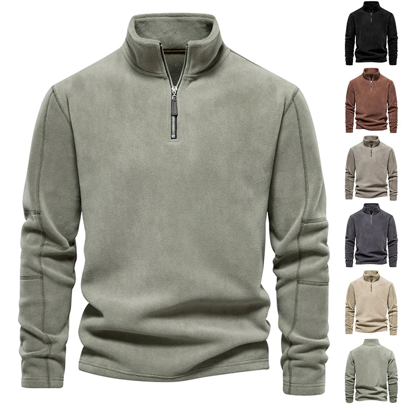 Green fleece pullover with zipper on a white background, shown in multiple color options.