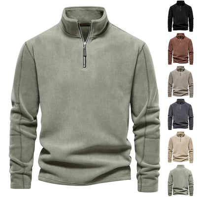 Green fleece pullover with zipper on a white background, shown in multiple color options.