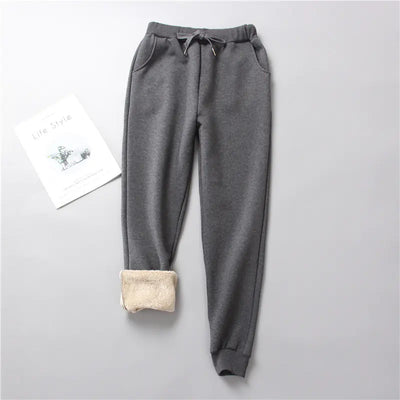 Gray sweatpants with fleece lining on a light gray background