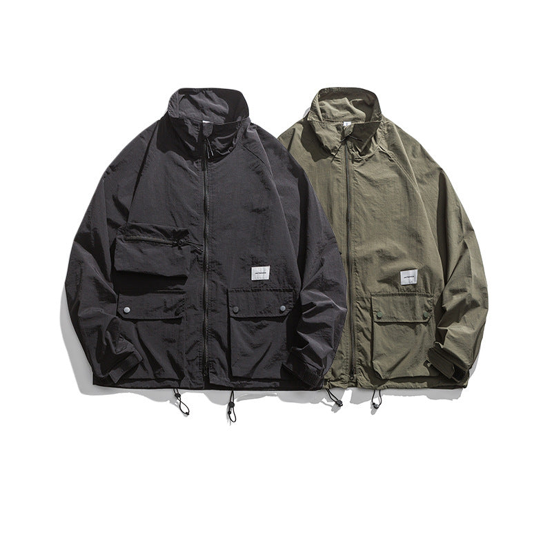 Black and green jackets on a white background