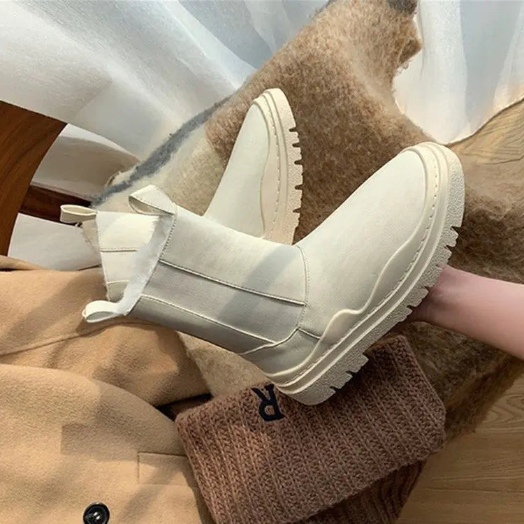 Person wearing beige boots