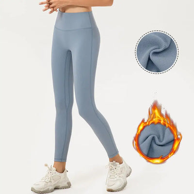 Light blue leggings with flame graphic and close-up of fabric texture on a white background