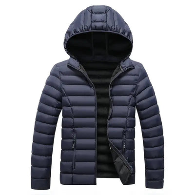 Blue puffer jacket with a hood on a white background