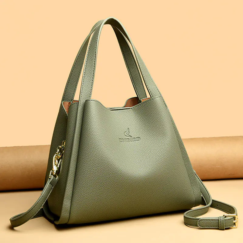 green handbag with a strap