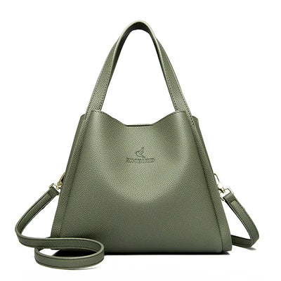 greenn handbag with a strap on white backgound