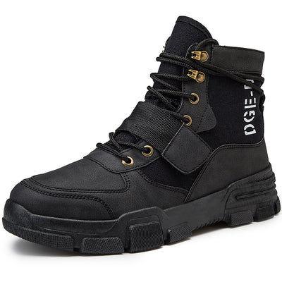 Black high-top boot with gold accents on a white background