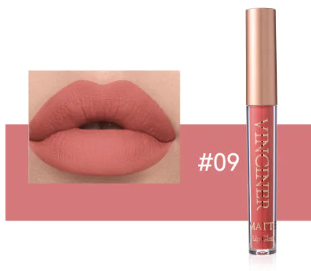 Lipstick with a close-up of lips wearing the shade, brand visible