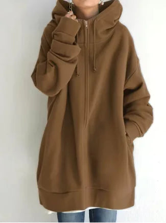 Brown long hoodie worn by a person on a white background