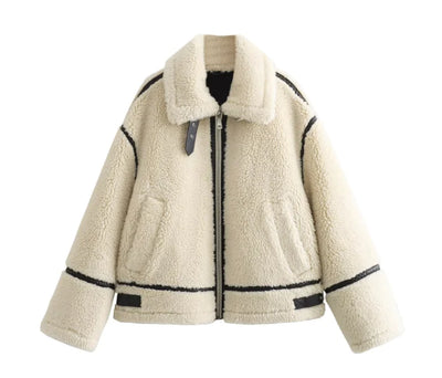 Beige sherpa jacket with black accents on a white background