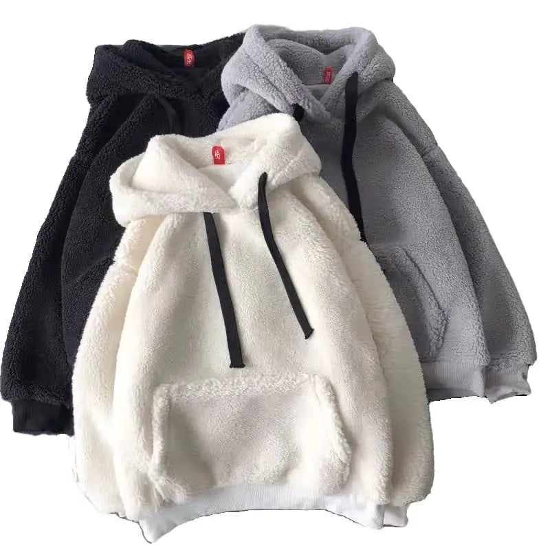 Three hoodies in black, white, and gray on a white background