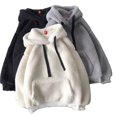 Three hoodies in black, white, and gray on a white background