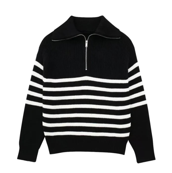 Black and white striped sweater with a quarter zip on a white background