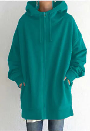 long Teal hoodie worn by a person on a plain background
